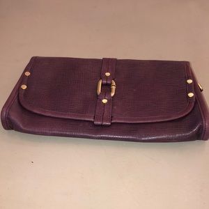 Purple leather clutch
